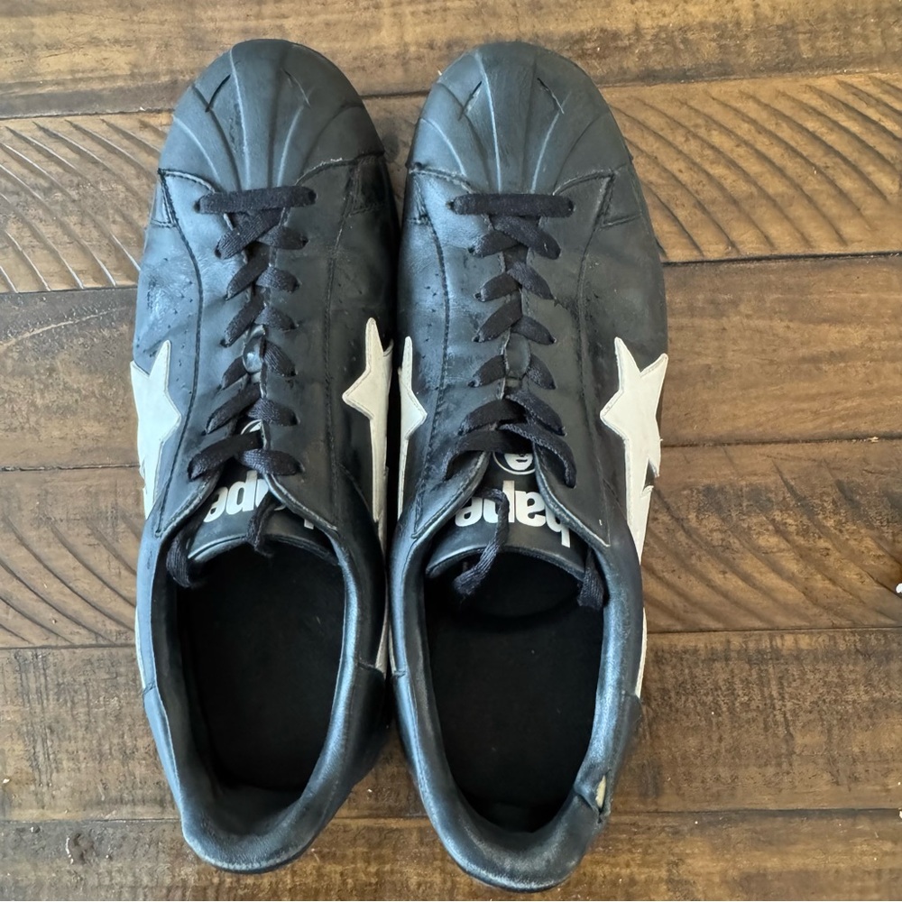 Golden Goose Men’s Black Leather Sneakers with White Star Accent